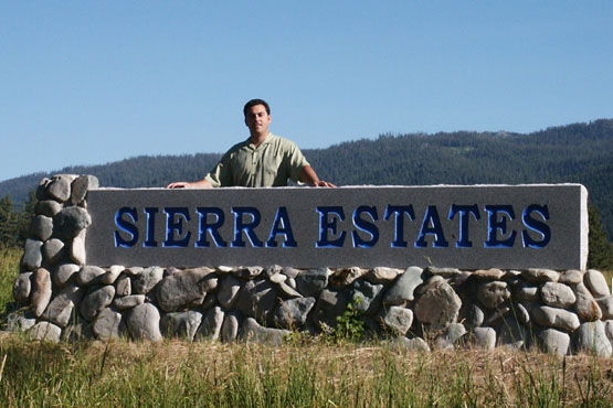 Large polished stone sign for Sierra Estates HOA